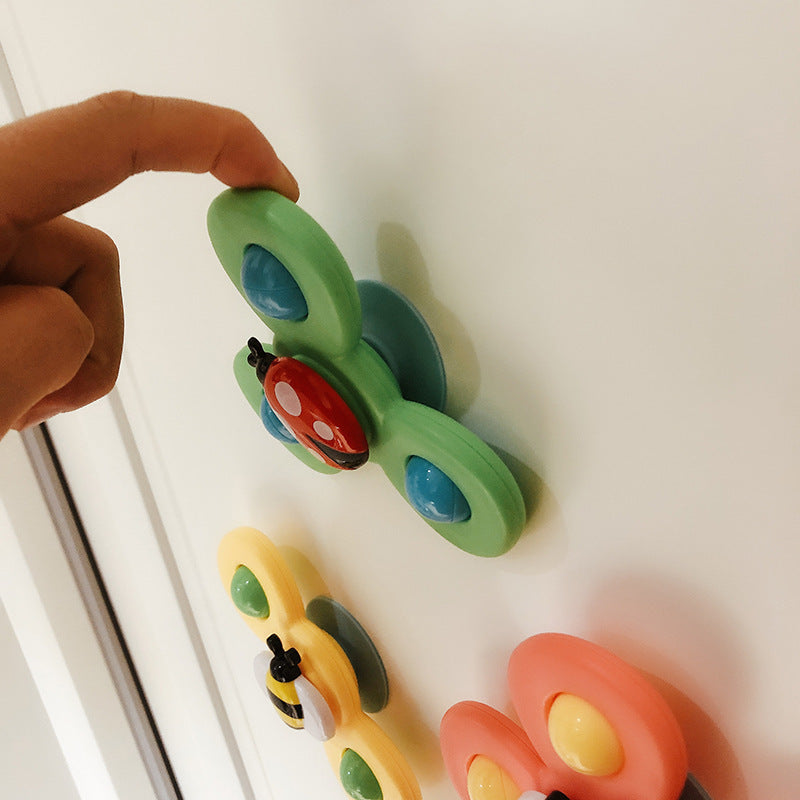 Toy available in 3 different designs. Attached with suction cup.