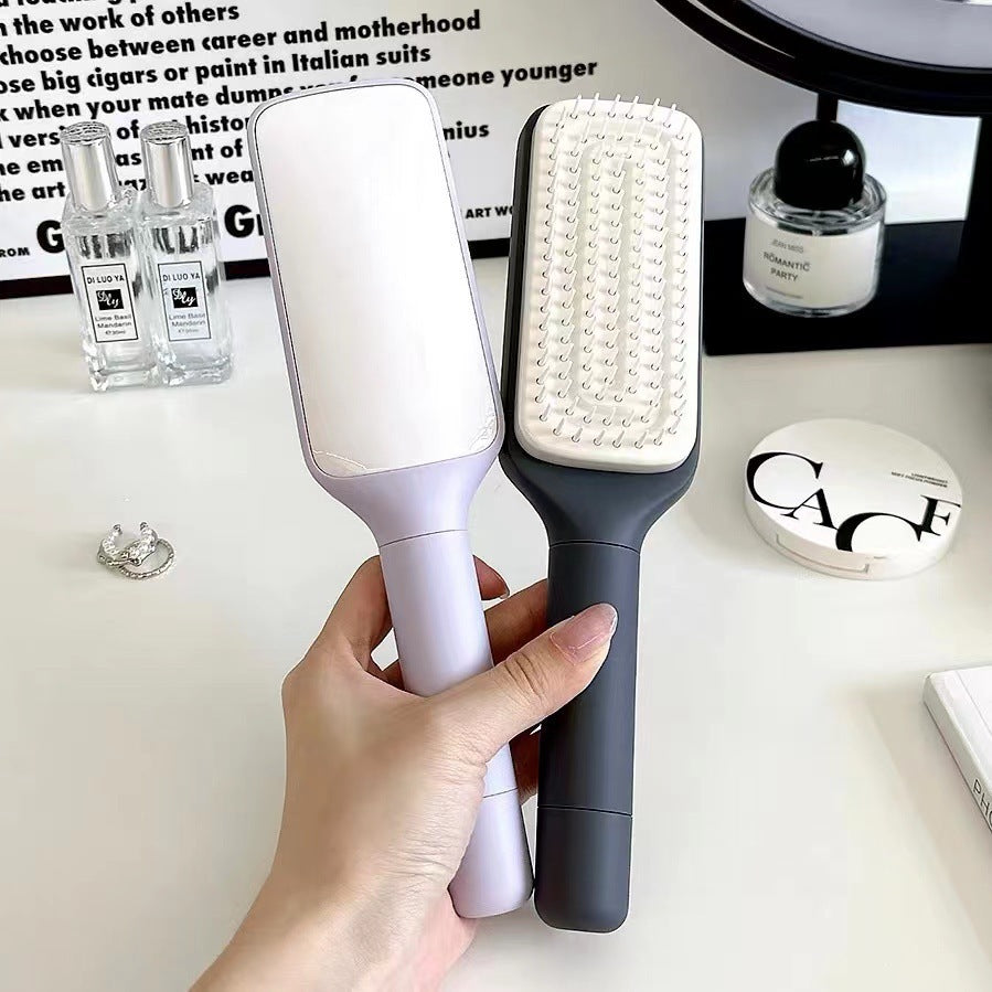 Simple self-cleaning hairbrush. Available in several colors.